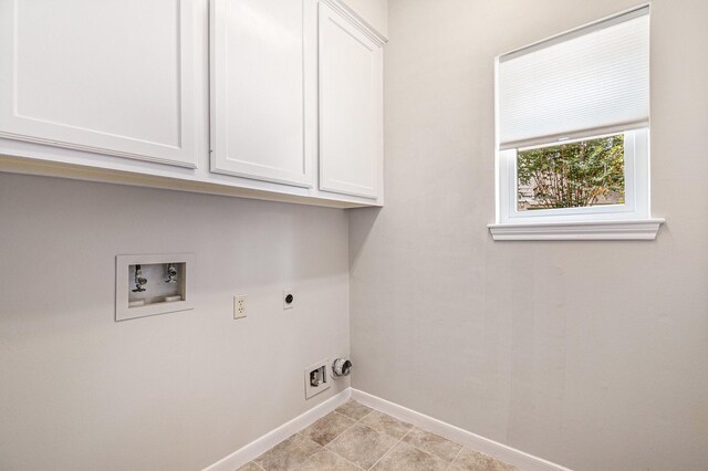 3506 Park Springs Ln, Houston, TX 77345 - laundry room featuring cabinet space, hookup for an electric dryer, baseboards, and washer hookup