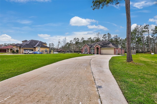 19715 Desna Dr, Porter, TX 77365 - view of front of house with concrete driveway, a front yard, a garage, and brick siding