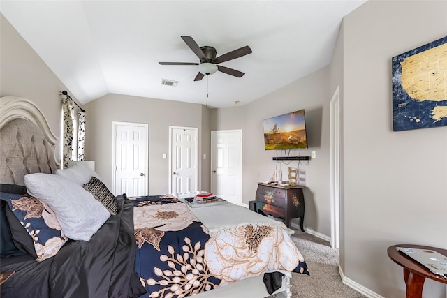 19715 Desna Dr, Porter, TX 77365 - bedroom with two closets, carpet floors, baseboards, a ceiling fan, and vaulted ceiling