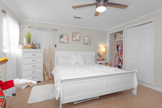 319 W Shore Dr, Kemah, TX 77565 - bedroom featuring light tile patterned floors, ornamental molding, and a ceiling fan