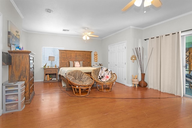 319 W Shore Dr, Kemah, TX 77565 - bedroom featuring light wood finished floors, crown molding, access to outside, baseboards, and a ceiling fan