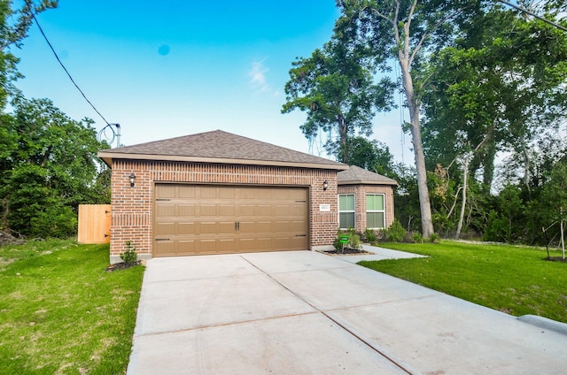 6523 Tuskegee St, Houston, TX 77091 - ranch-style house featuring brick siding, a front lawn, driveway, and an attached garage
