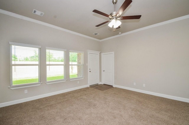 6523 Tuskegee St, Houston, TX 77091 - carpeted spare room featuring ornamental molding, baseboards, and ceiling fan