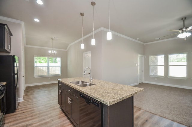 6523 Tuskegee St, Houston, TX 77091 - kitchen with a sink, black appliances, open floor plan, baseboards, and dark brown cabinetry