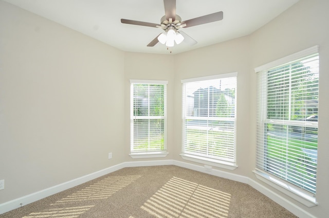 6523 Tuskegee St, Houston, TX 77091 - unfurnished room with carpet flooring, baseboards, and a ceiling fan