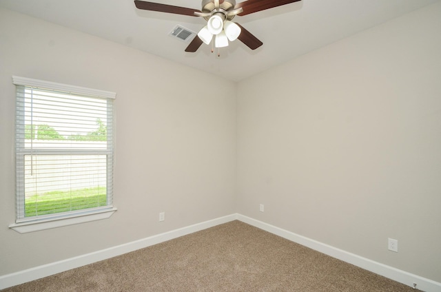 6523 Tuskegee St, Houston, TX 77091 - carpeted spare room with baseboards and ceiling fan