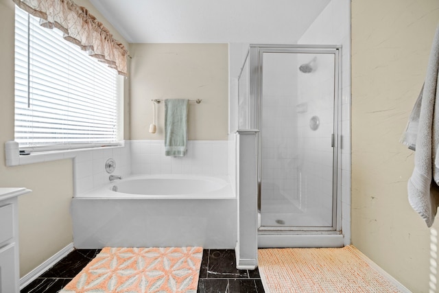 1802 Moston Dr, Spring, TX 77386 - full bath with a garden tub, a stall shower, vanity, and baseboards
