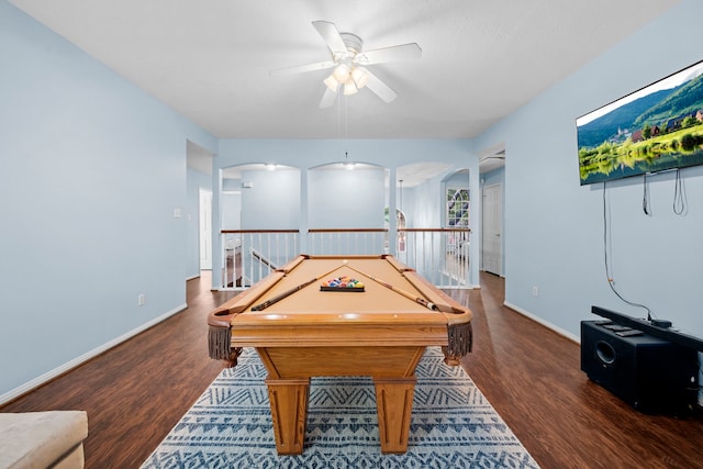 1802 Moston Dr, Spring, TX 77386 - recreation room featuring arched walkways, a ceiling fan, wood finished floors, and baseboards