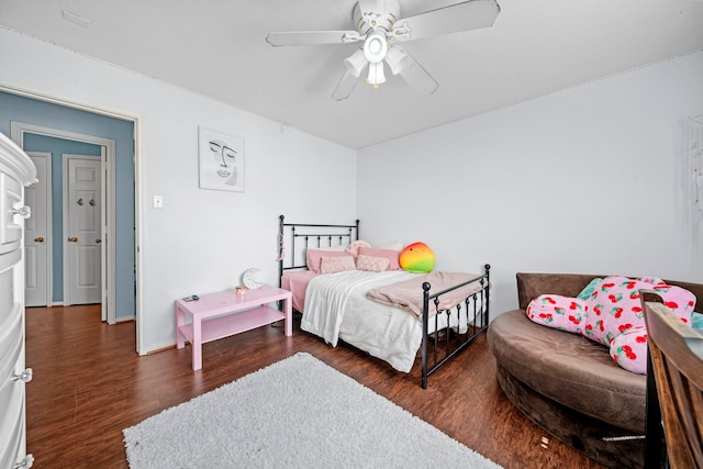 1802 Moston Dr, Spring, TX 77386 - bedroom with wood finished floors and ceiling fan