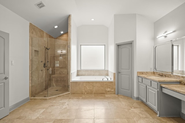 9714 Braesmont Dr, Houston, TX 77096 - full bath with a bath, vanity, a shower stall, recessed lighting, and lofted ceiling