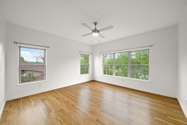 9714 Braesmont Dr, Houston, TX 77096 - spare room with baseboards, light wood finished floors, and a ceiling fan