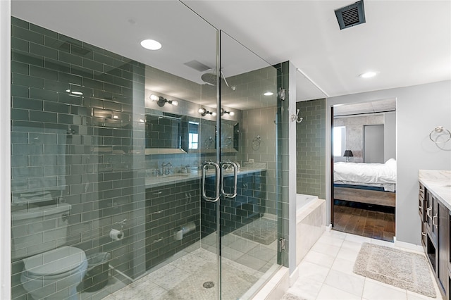 2000 Bagby St Unit 13430, Houston, TX 77002 - bathroom featuring a shower stall, vanity, tile patterned flooring, ensuite bath, and recessed lighting