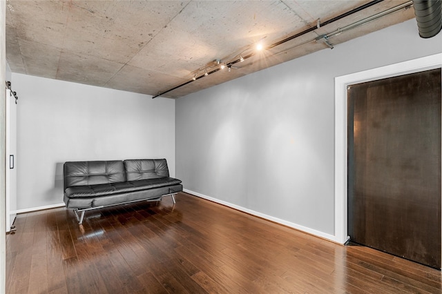 2000 Bagby St Unit 13430, Houston, TX 77002 - living area with hardwood / wood-style flooring, baseboards, and track lighting