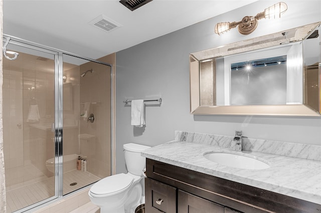 2000 Bagby St Unit 13430, Houston, TX 77002 - bathroom with toilet, vanity, and a shower stall