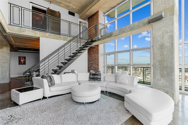 2000 Bagby St Unit 13430, Houston, TX 77002 - living area with a high ceiling and stairway