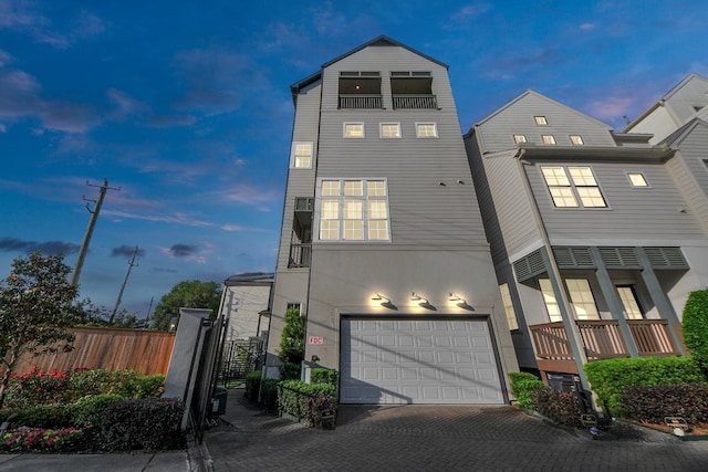 4005 Woodshire Village Ests, Houston, TX 77025 - view of front of property with an attached garage and decorative driveway