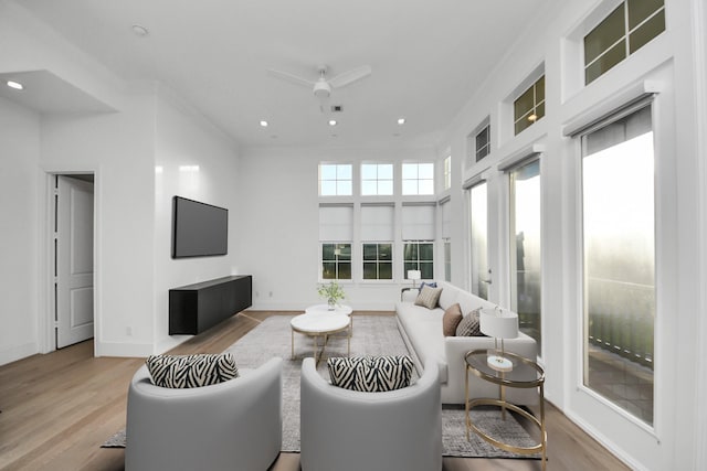4005 Woodshire Village Ests, Houston, TX 77025 - living area featuring wood finished floors, recessed lighting, a ceiling fan, and baseboards