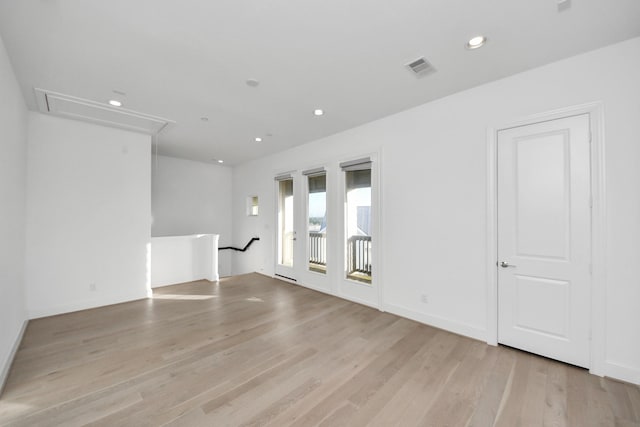 4005 Woodshire Village Ests, Houston, TX 77025 - empty room with attic access, light wood finished floors, and recessed lighting