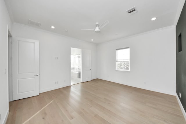 4005 Woodshire Village Ests, Houston, TX 77025 - unfurnished bedroom with crown molding, light wood-style flooring, baseboards, ensuite bathroom, and recessed lighting