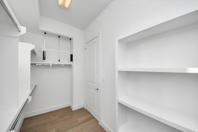 4005 Woodshire Village Ests, Houston, TX 77025 - spacious closet featuring wood finished floors