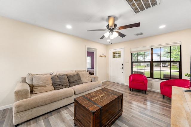 2915 Robertson St, Houston, TX 77009 - living area with wood finished floors, baseboards, ceiling fan, and recessed lighting