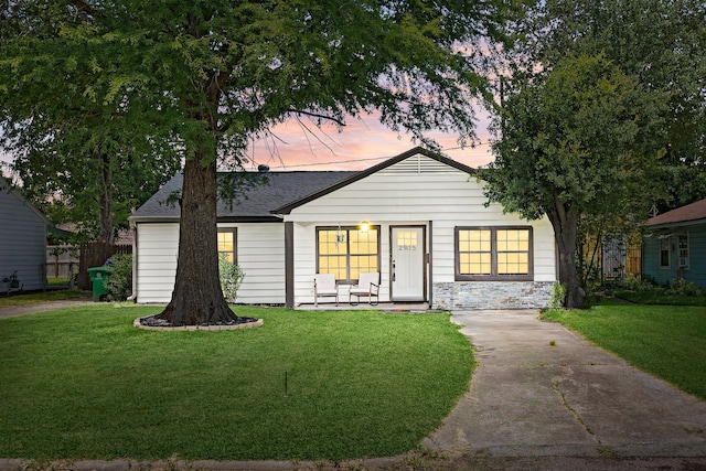 2915 Robertson St, Houston, TX 77009 - view of front of home with a lawn and a shingled roof