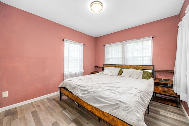 2915 Robertson St, Houston, TX 77009 - bedroom featuring wood finished floors and baseboards