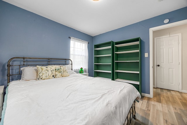 2915 Robertson St, Houston, TX 77009 - bedroom featuring wood finished floors and baseboards