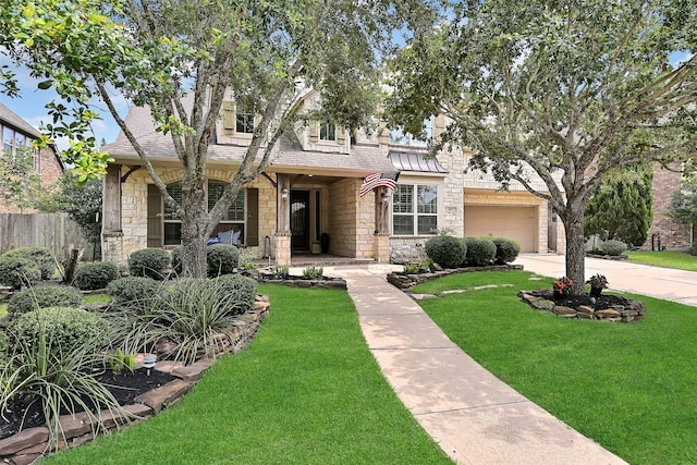 1013 Bolivar Point Ln, Friendswood, TX 77546 - view of front of house with stone siding, driveway, and roof with shingles
