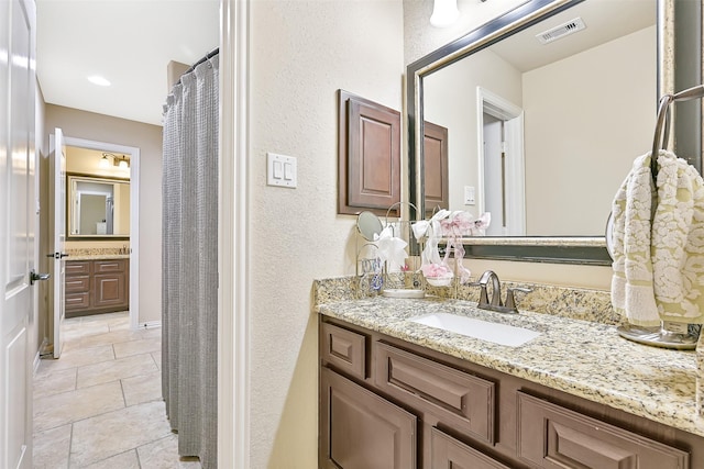 1013 Bolivar Point Ln, Friendswood, TX 77546 - full bath with vanity and tile patterned floors