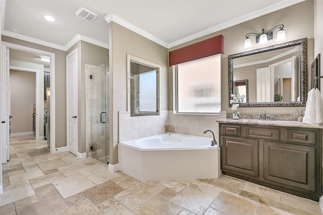 1013 Bolivar Point Ln, Friendswood, TX 77546 - bathroom with vanity, a garden tub, a shower stall, stone tile floors, and crown molding