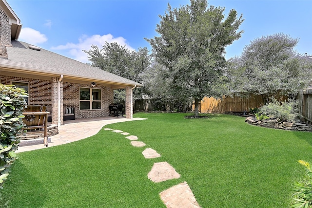 1013 Bolivar Point Ln, Friendswood, TX 77546 - view of yard with a ceiling fan and a patio