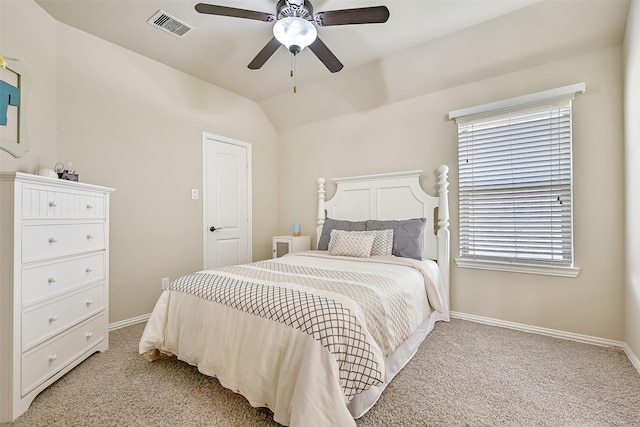 1013 Bolivar Point Ln, Friendswood, TX 77546 - bedroom featuring baseboards, light carpet, lofted ceiling, and a ceiling fan