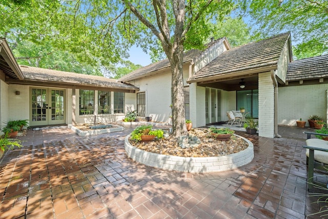 14119 Kiamesha Ct, Houston, TX 77069 - view of patio with french doors and a ceiling fan