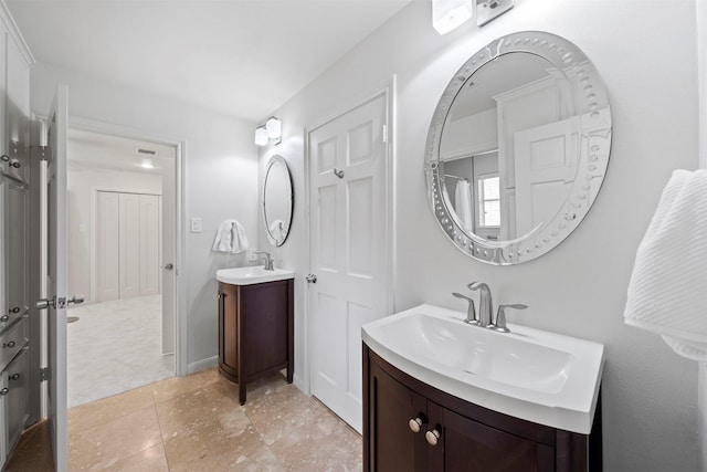 14119 Kiamesha Ct, Houston, TX 77069 - bathroom featuring two vanities and tile patterned flooring