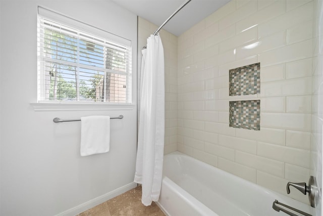 14119 Kiamesha Ct, Houston, TX 77069 - bathroom with baseboards and shower / bath combination with curtain