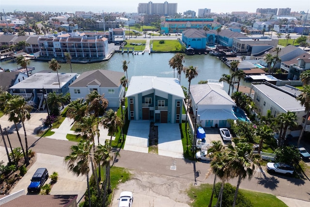 5606 Circe Cir Unit B, South Padre Island, TX 78597 - aerial perspective of suburban area featuring a large body of water