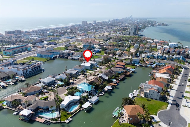 5606 Circe Cir Unit B, South Padre Island, TX 78597 - aerial view of property and surrounding area featuring a large body of water, nearby urban area, and nearby suburban area