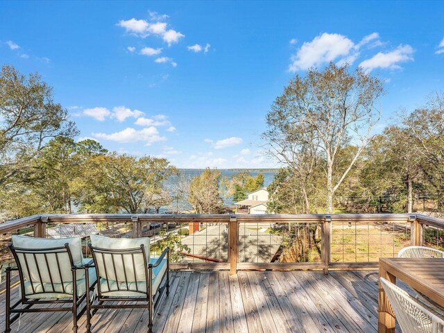 14510 Henry Calfee Dr, Willis, TX 77318 - view of wooden terrace