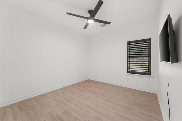 28411 Calaveras Creek Ct, Houston, TX 77336 - unfurnished room featuring light wood-style floors, ceiling fan, and baseboards