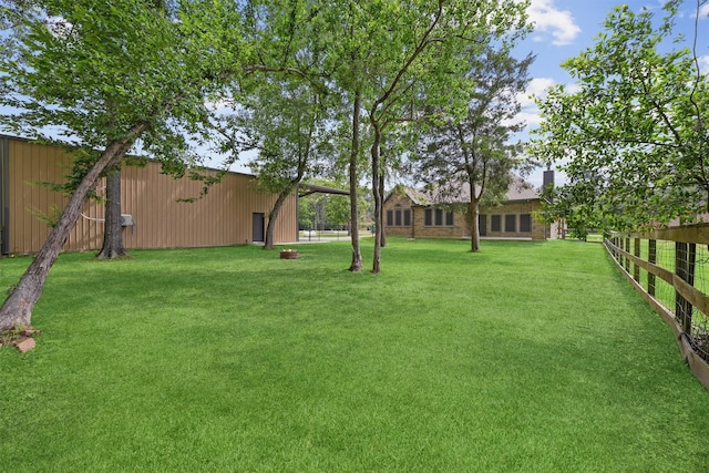 28411 Calaveras Creek Ct, Houston, TX 77336 - view of yard with an outbuilding