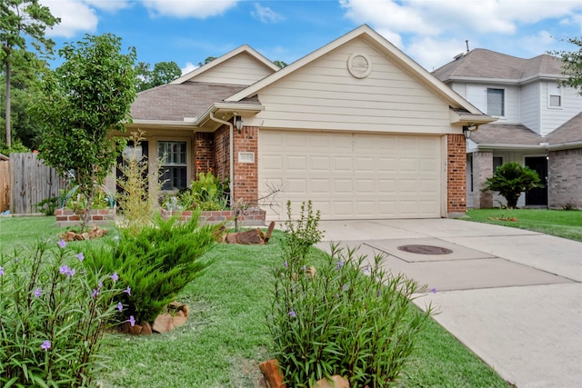 2639 Cypress Island Dr, Houston, TX 77073 - view of front of house featuring brick siding, a garage, and driveway