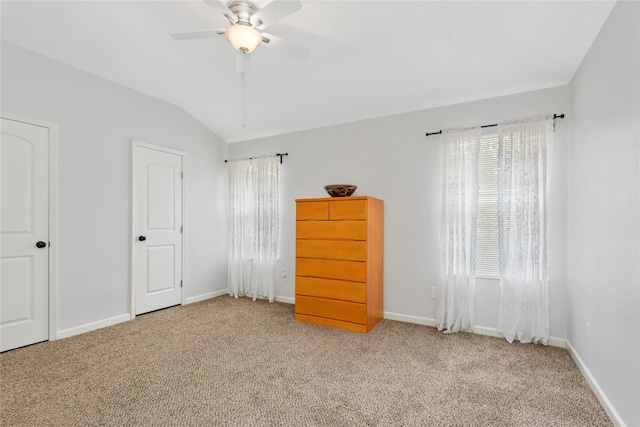 2639 Cypress Island Dr, Houston, TX 77073 - unfurnished bedroom with multiple windows, carpet flooring, vaulted ceiling, and baseboards