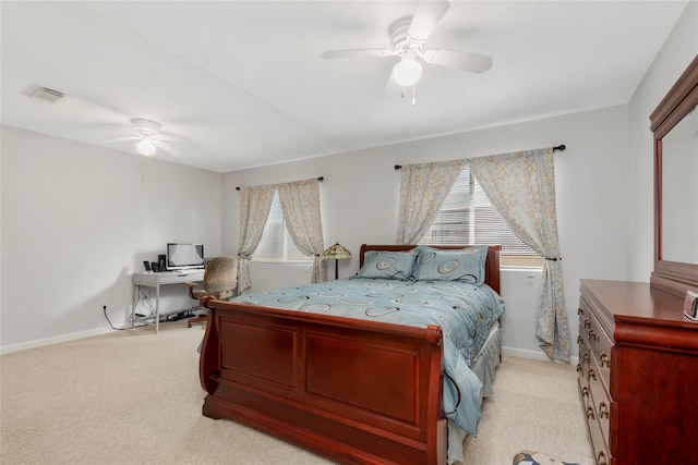 2639 Cypress Island Dr, Houston, TX 77073 - bedroom with multiple windows, light carpet, and baseboards