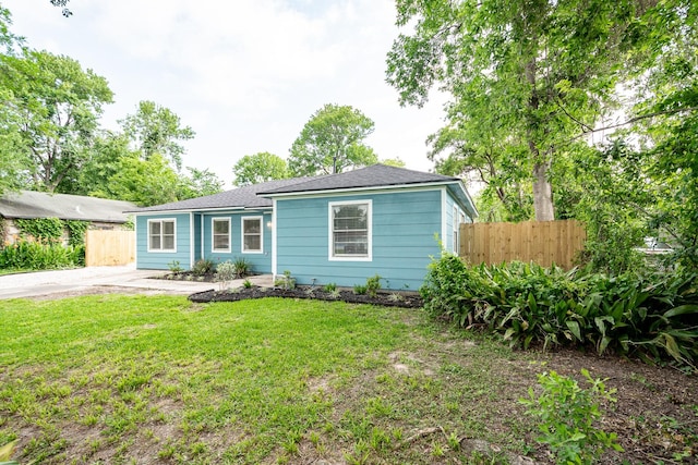 308 Greenbriar Dr, Baytown, TX 77520 - view of front of home featuring a shingled roof