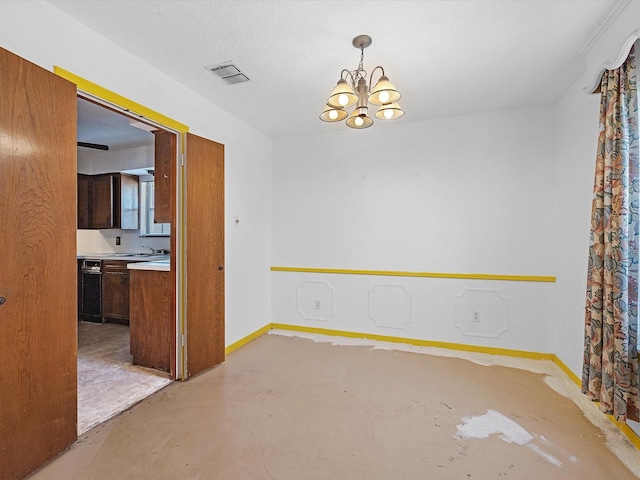 21326 Four Oaks Dr, Houston, TX 77073 - unfurnished dining area featuring concrete floors, a chandelier, baseboards, and a sink