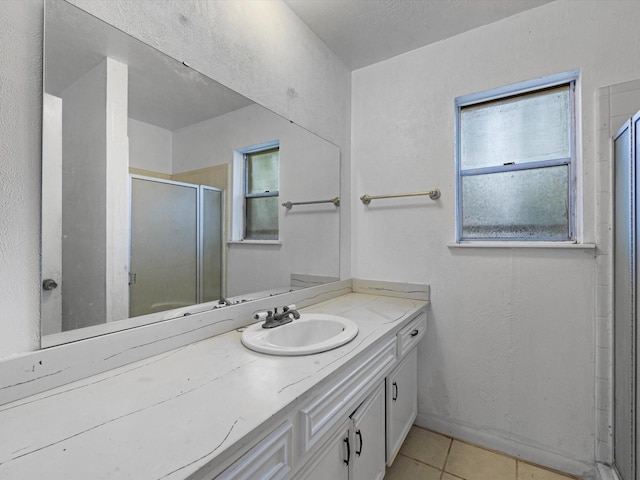 21326 Four Oaks Dr, Houston, TX 77073 - full bath with vanity, a stall shower, and tile patterned flooring