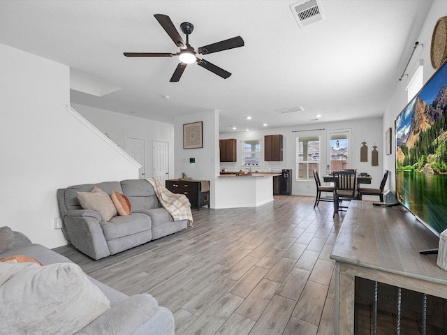 15618 Cliffside Arbor Ln, Houston, TX 77044 - living area with recessed lighting, a ceiling fan, and light wood finished floors