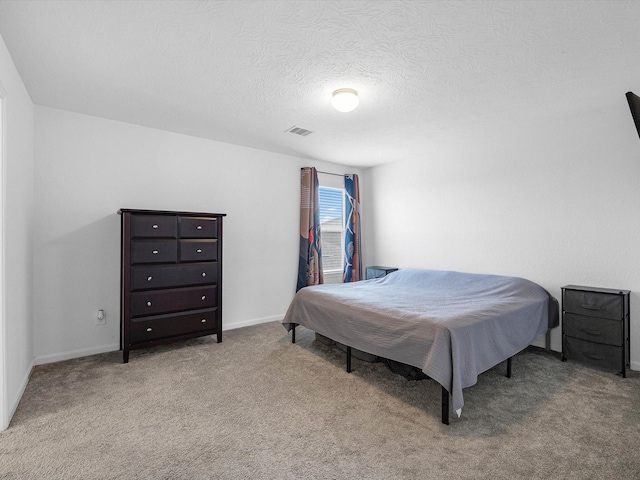 15618 Cliffside Arbor Ln, Houston, TX 77044 - carpeted bedroom featuring a textured ceiling and baseboards