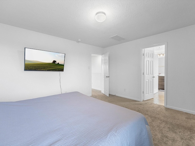 15618 Cliffside Arbor Ln, Houston, TX 77044 - bedroom featuring carpet, baseboards, and a textured ceiling